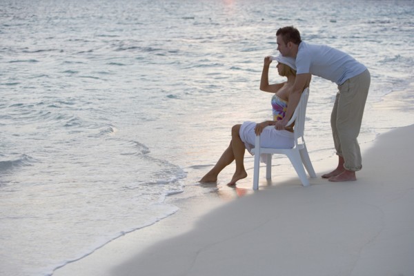 Couple relaxing at the beach.
