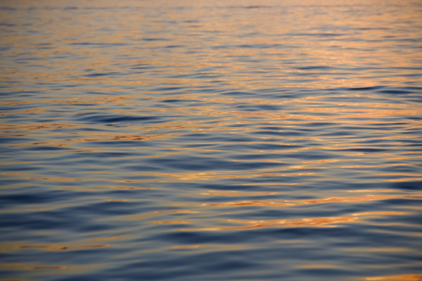 Subtle sunshine on water.