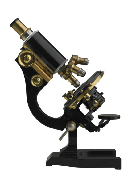 An old fashioned microscope.