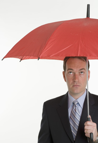Man holding an umbrella.