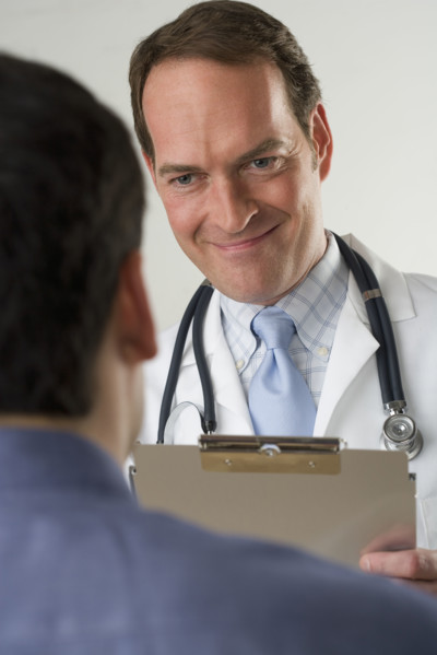 Doctor meeting with patient.