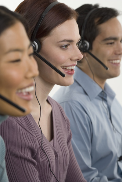 Phone operators using headsets.