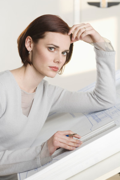 Portrait of woman at drawing board.