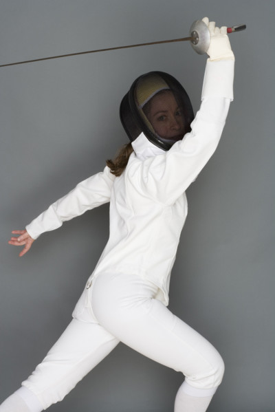 Person engaged in fencing.