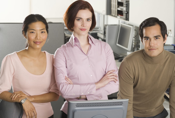 Portrait of three office workers.