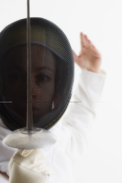 Closeup of a fencer.