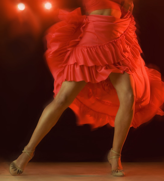 Woman dancing at nightclub.