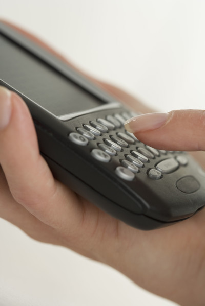 Woman holding a smart phone.