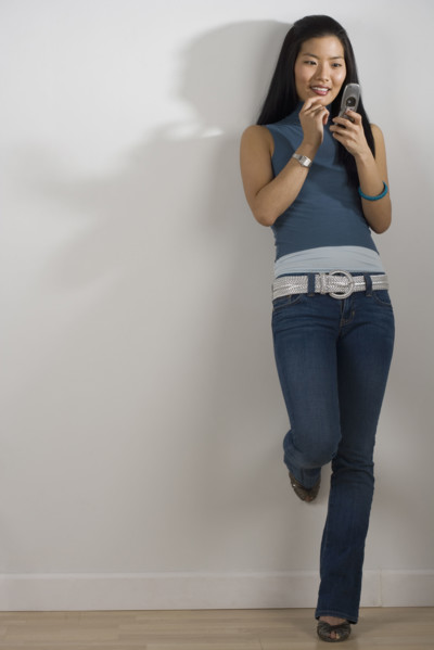 Young woman using a mobile phone.