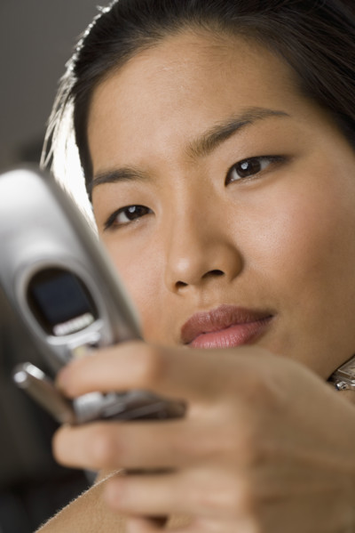 Young woman using a mobile phone.