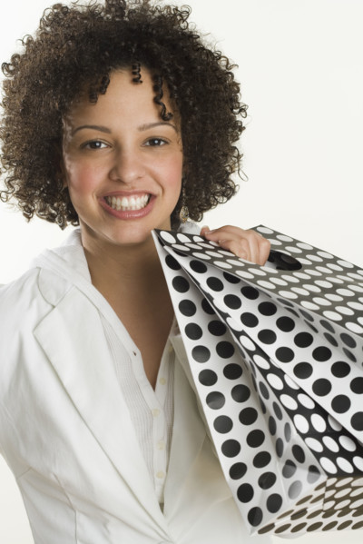 Happy woman with shopping bags.