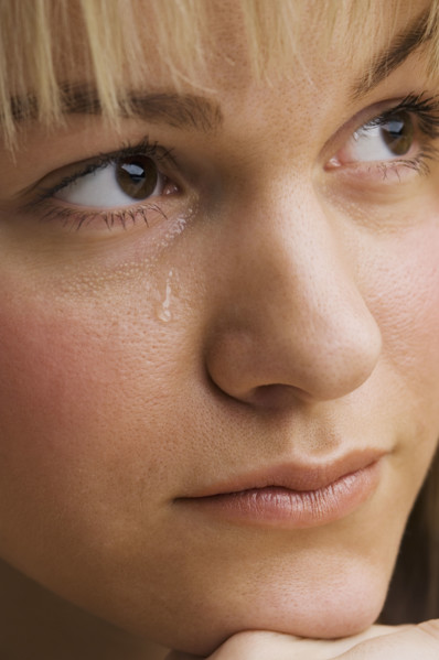 Close up of woman crying.