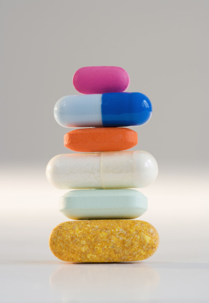 Close up of stacked pills.