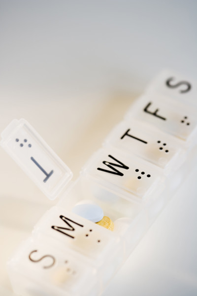 Close up of pill organizer.