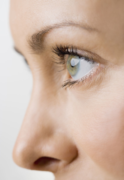 Close up profile of a womans face.