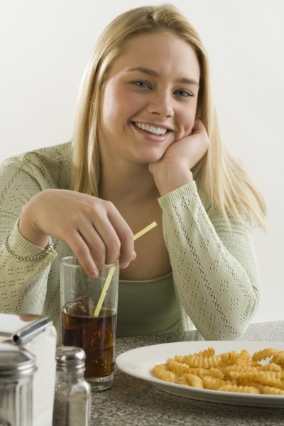 Portrait of woman in a diner.