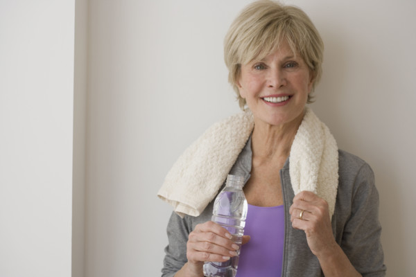 Portrait of senior woman wearing athletic gear.