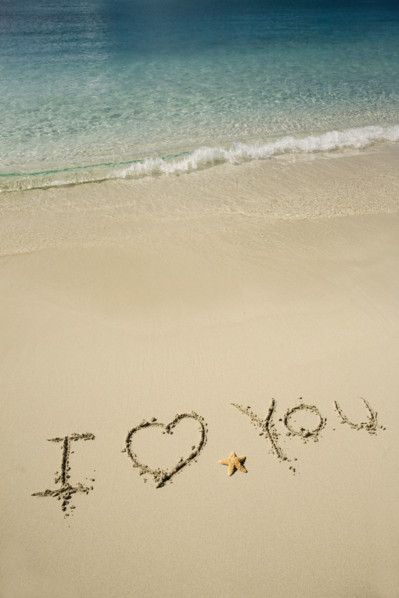 I Love You written in sand.