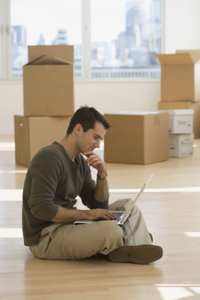 Businessman working in new office.
