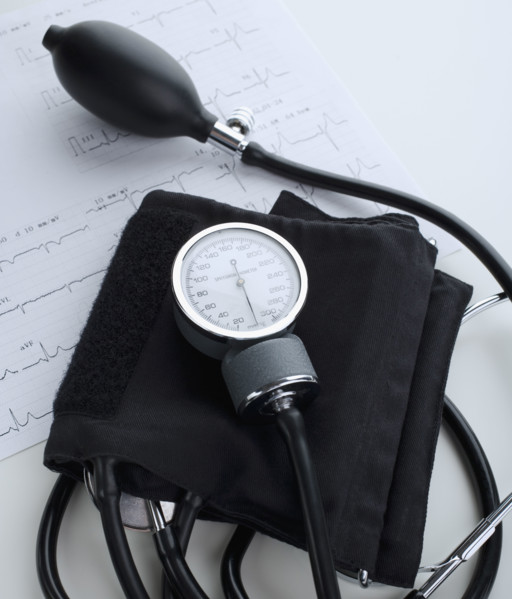 Blood pressure cuff on heart rate printout.