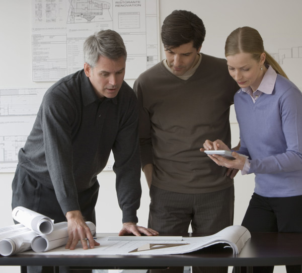 Businesspeople in architect’s office.