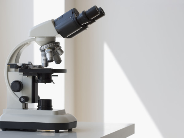 Microscope on table.