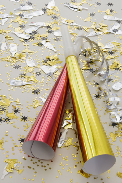 Party noisemakers and confetti.