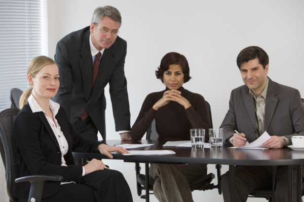 Group of businesspeople in meeting.