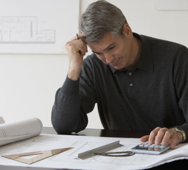 Male architect working at desk.