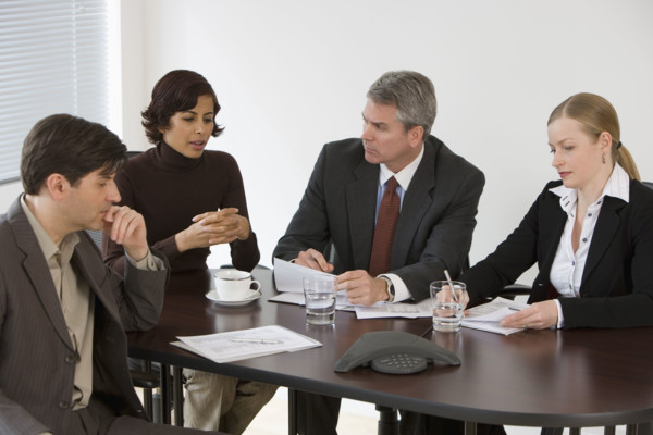 Group of businesspeople in meeting.