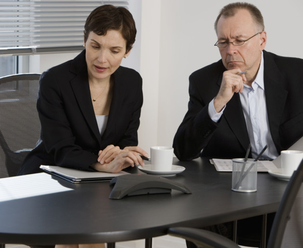 Businesspeople having teleconference.