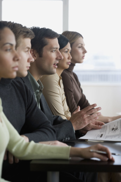 Group of businesspeople at meeting.