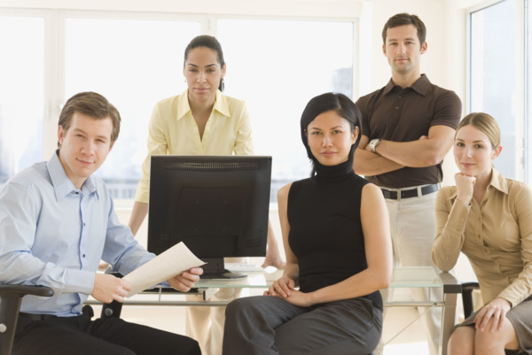 Portrait of businesspeople in office.