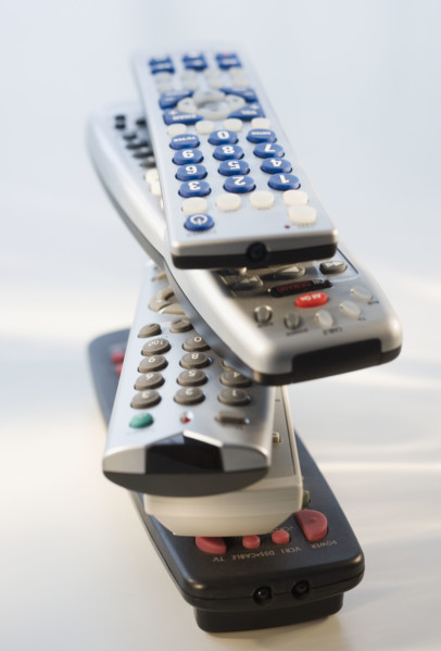 Stack of remote controls.
