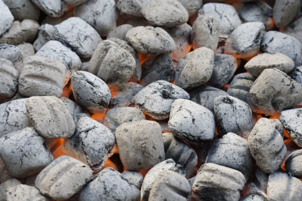 Close up of charcoal briquette fire.