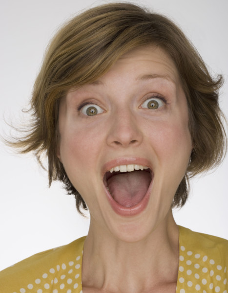Close up of woman yelling.