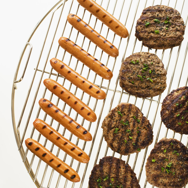 Hot dogs and hamburgers on grill.