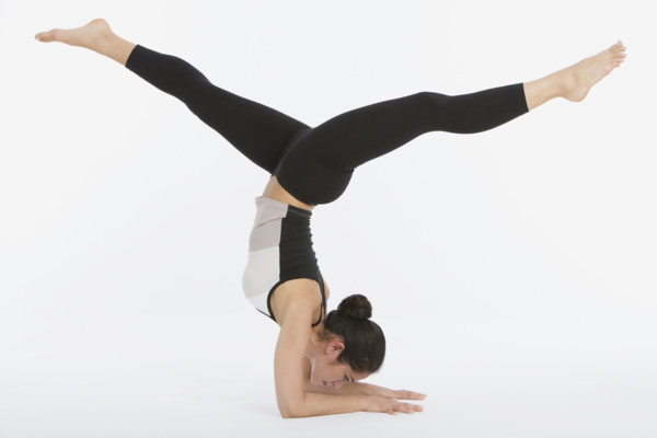 Woman practicing yoga.