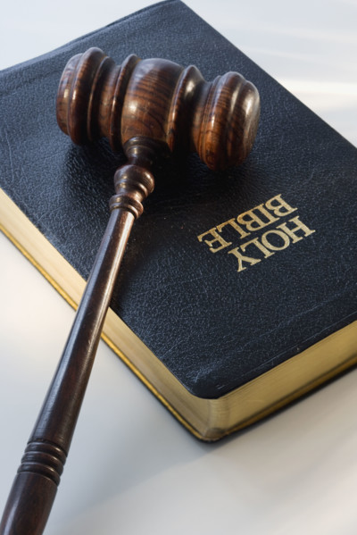 Judge’s gavel on bible.