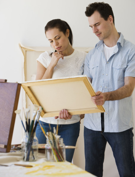 Couple looking at artwork.