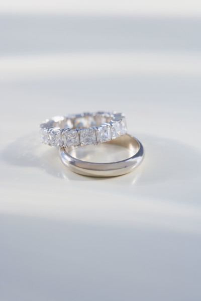 Close up of engagement and wedding rings.