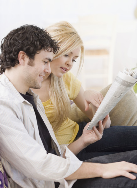 Couple reading newspaper. Date : 2007