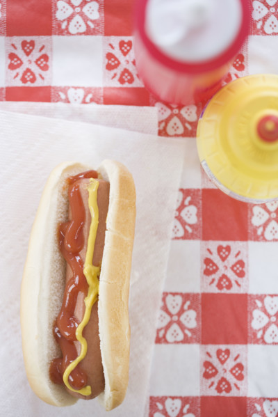 High angle view of hot dog with ketchup and mustard. Date : 2006