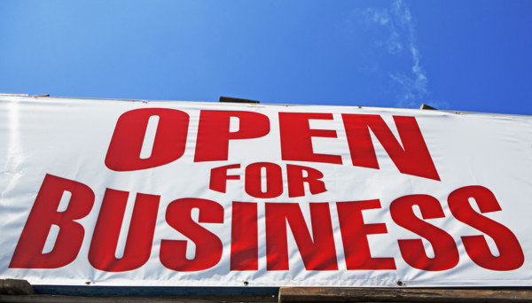 Low angle view of Open for Business sign. Date : 2007