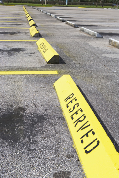 Row of Reserved parking spaces. Date : 2007