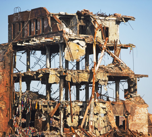 Demolished building under blue sky. Date : 2007