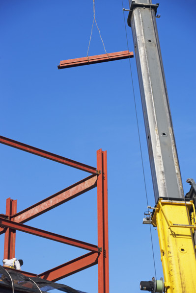 Crane holding steel girder. Date : 2007