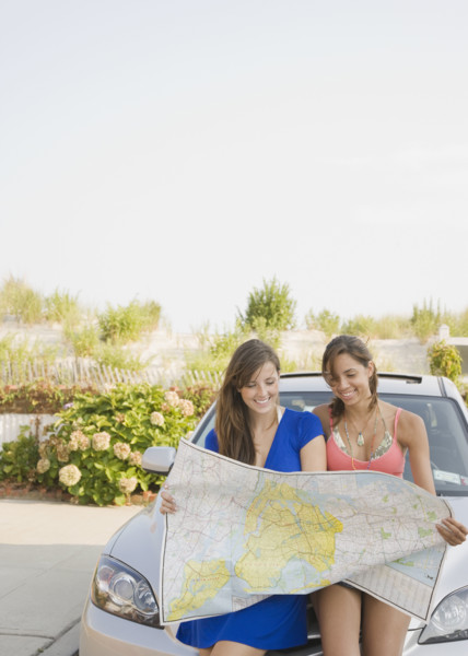 Young women looking at map. Date : 2007