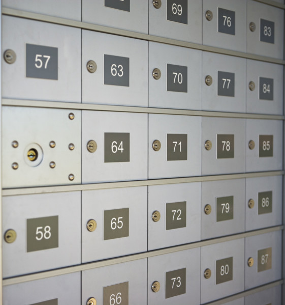Wall of numbered mailboxes. Date : 2007