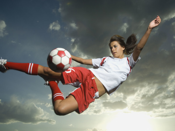 Low angle view of soccer player jumping. Date : 2007